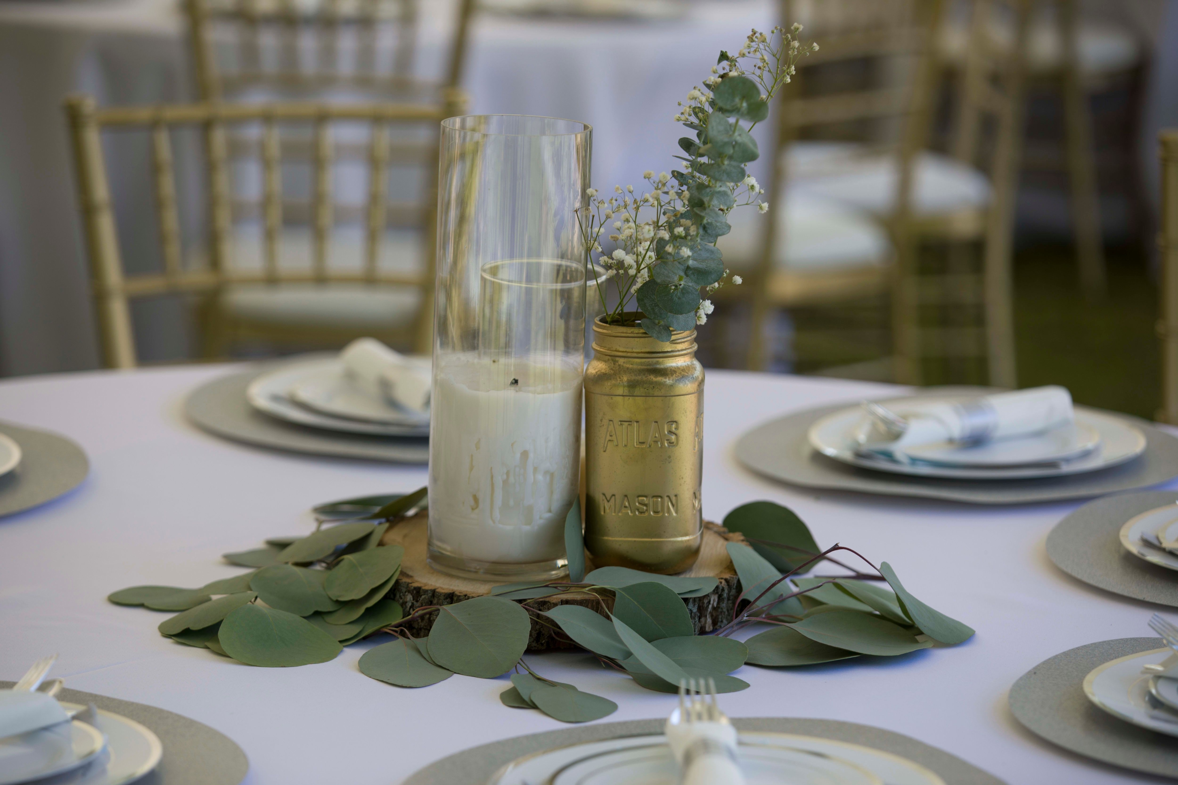 The wedding ring, Heart to heart photography, Thorold wedding photographer, wedding photographer, outdoor wedding, wedding table centrepiece, white candle and greenery leaves