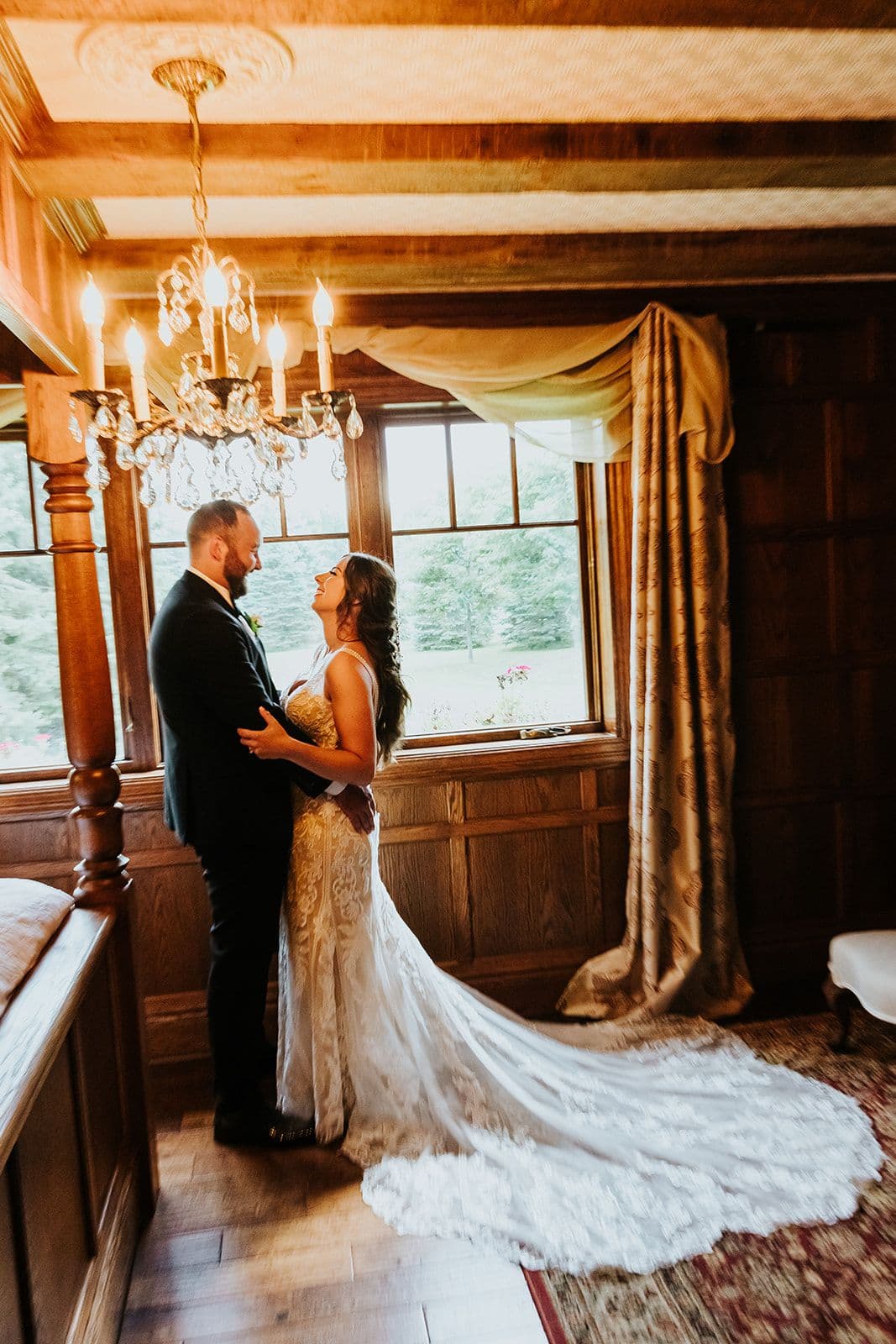Erin Estates, Wedding Venue, Fedora Media, Cambridge Wedding Photographer, Bride & Groom standing in front of window looking at each other
