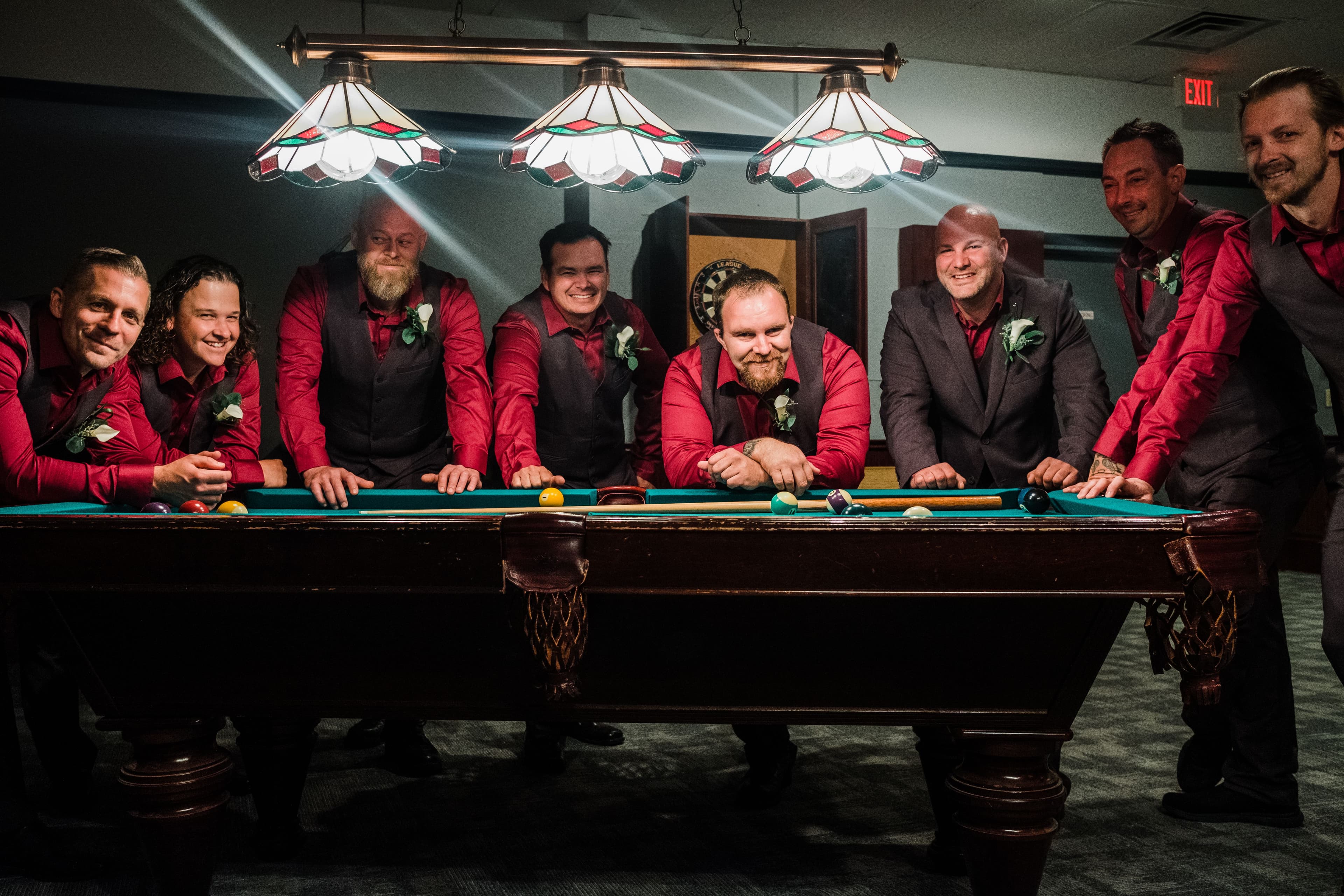 The wedding ring, Waterloo Regional Police Association, BMKH Photography, KW wedding photographer, Waterloo wedding venue, Kitchener wedding venue, Cambridge wedding venue, groom and groomsmen standing around a pool table