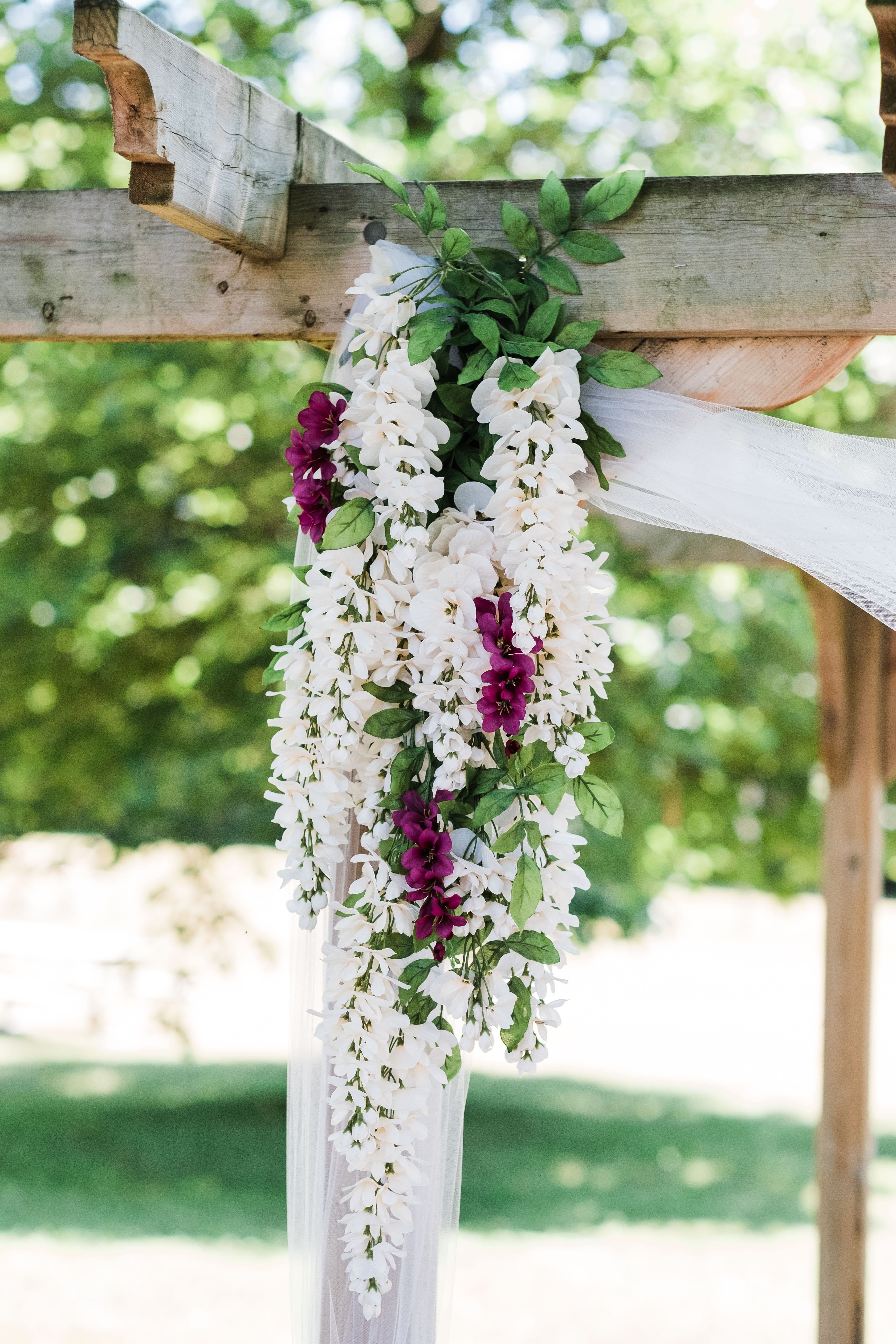 The wedding ring, Waterloo Regional Police Association, BMKH Photography, KW wedding photographer, Waterloo wedding venue, Kitchener wedding venue, Cambridge wedding venue, wedding decor, wedding decor, white flowers draping down wedding arch