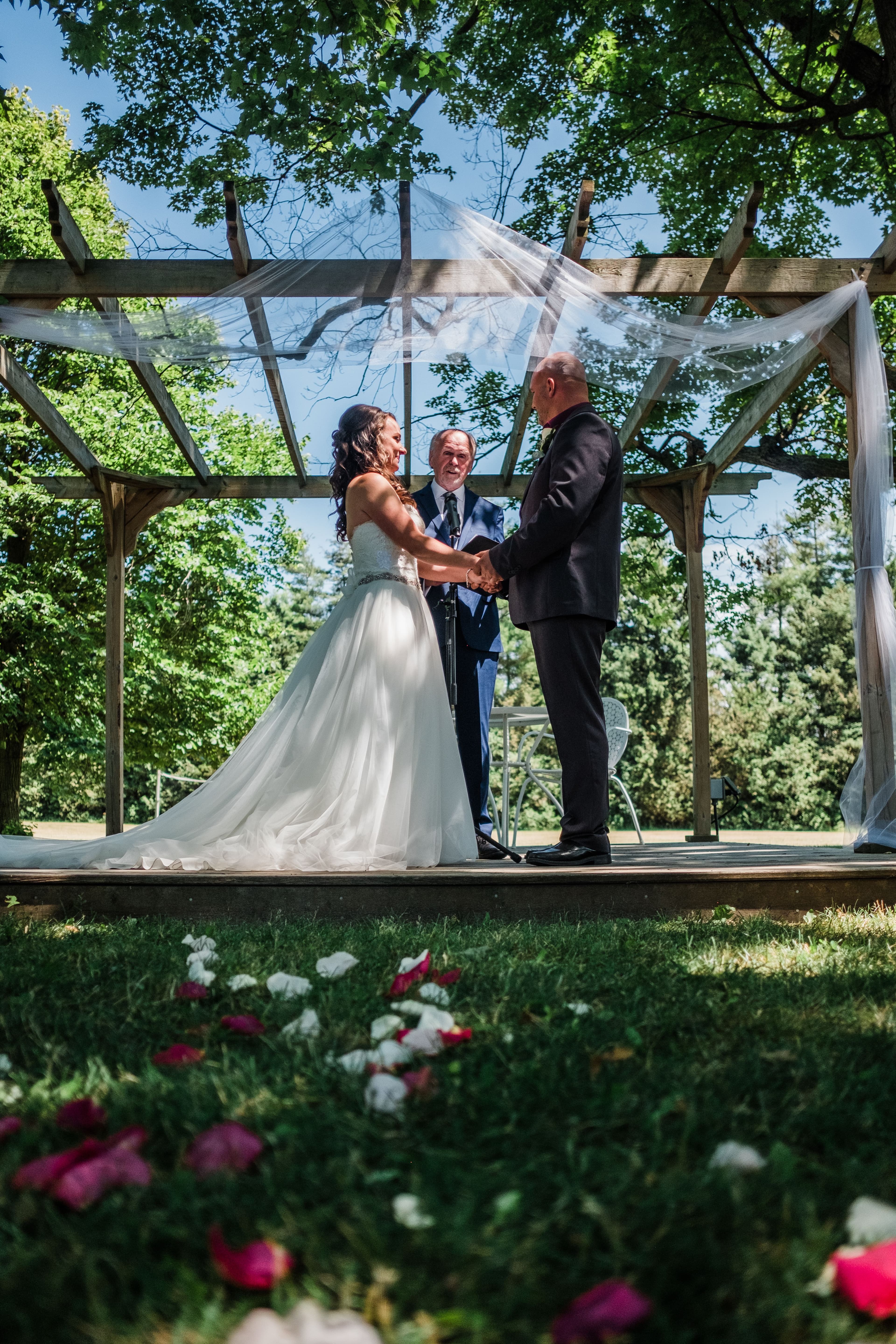 The wedding ring, Waterloo Regional Police Association, BMKH Photography, KW wedding photographer, Waterloo wedding venue, Kitchener wedding venue, Cambridge wedding venue, wedding decor, Bride and groom standing at alter during ceremony