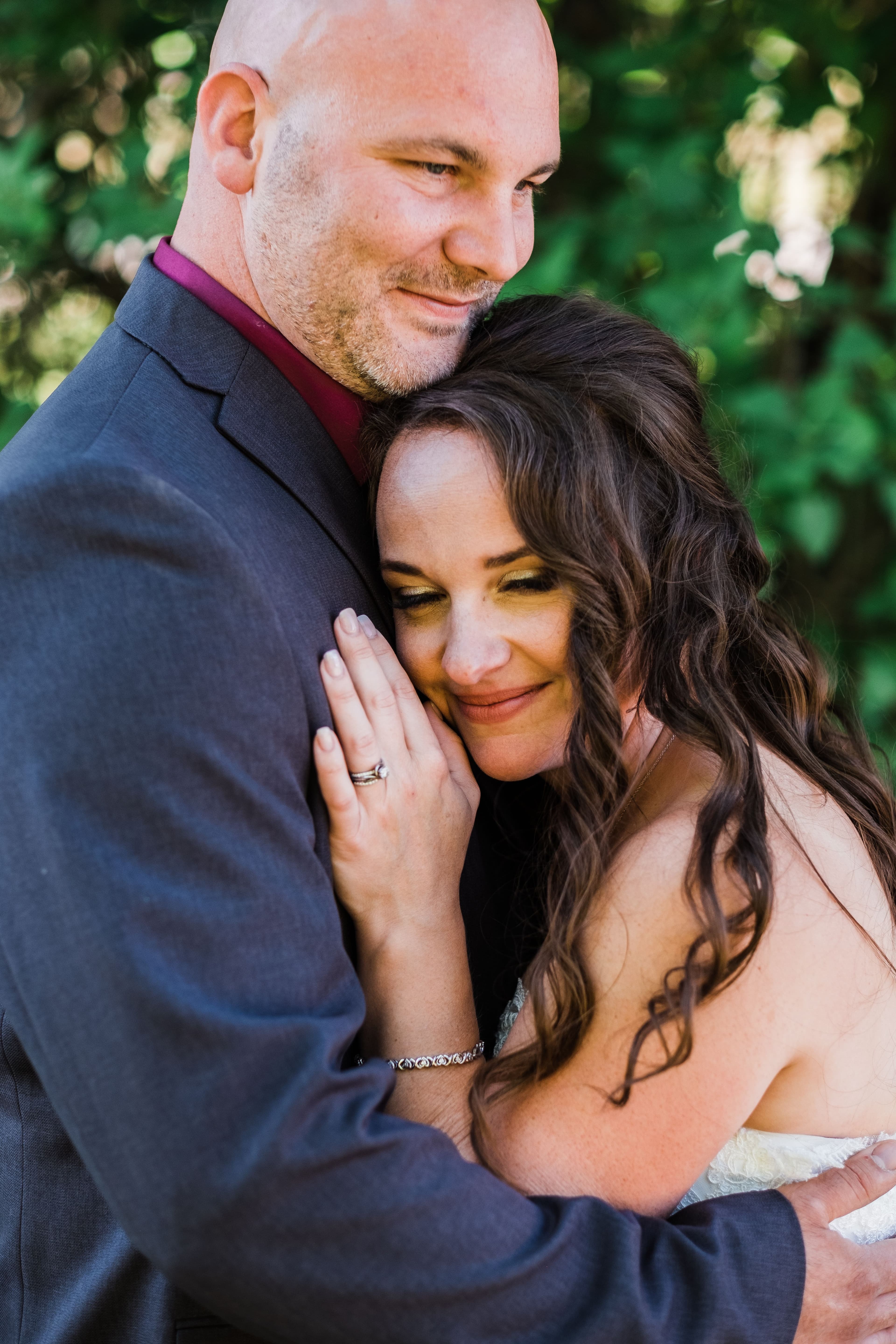 The wedding ring, Waterloo Regional Police Association, BMKH Photography, KW wedding photographer, Waterloo wedding venue, Kitchener wedding venue, Cambridge wedding venue, wedding decor, bride and groom hugging