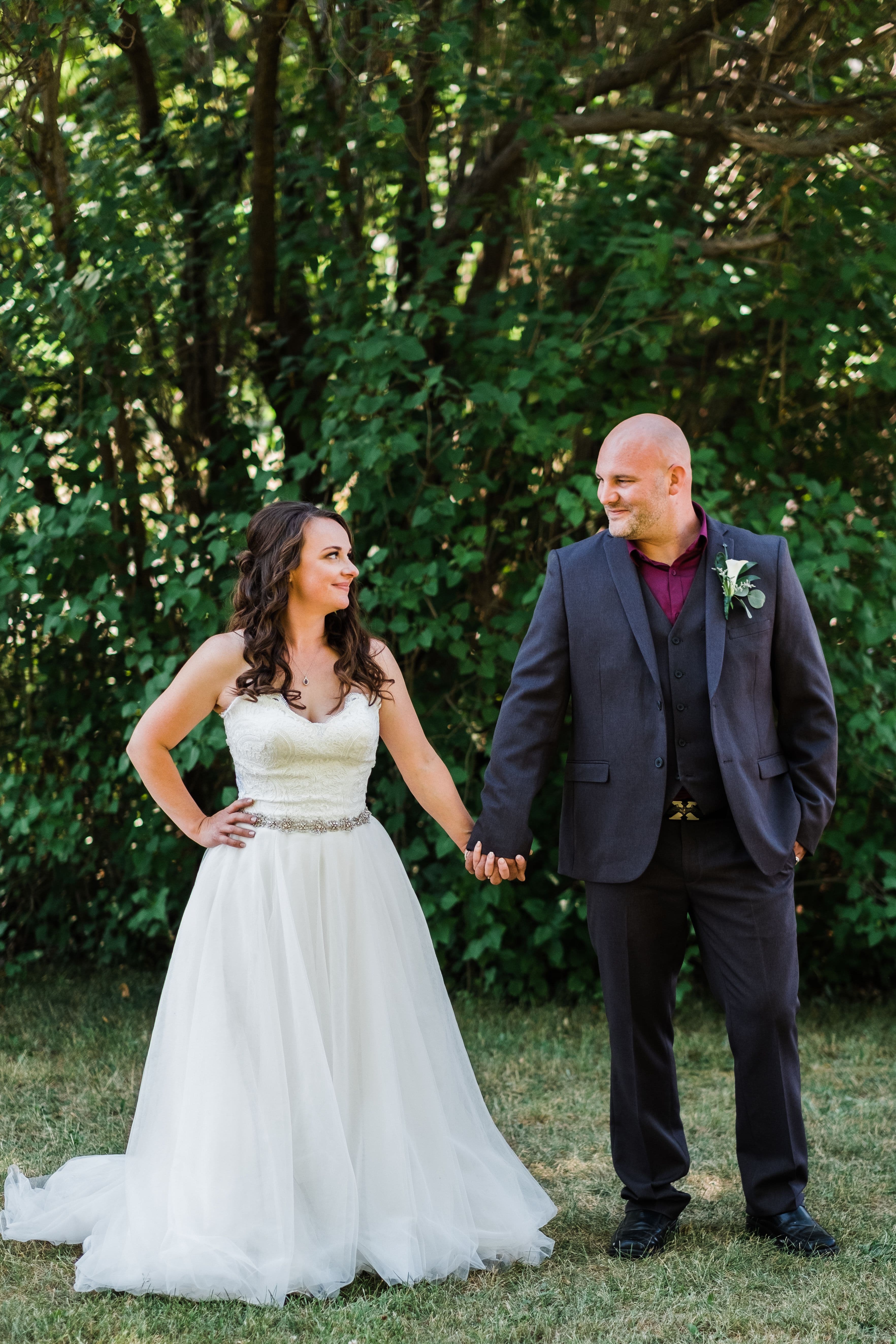 The wedding ring, Waterloo Regional Police Association, BMKH Photography, KW wedding photographer, Waterloo wedding venue, Kitchener wedding venue, Cambridge wedding venue, bride and groom holding hands looking at each other