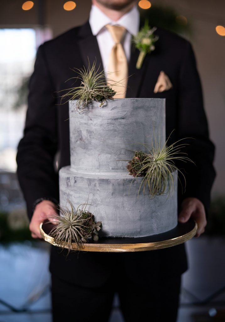 I'm so in love with this buttercream concrete cake, complete with fresh succulents.