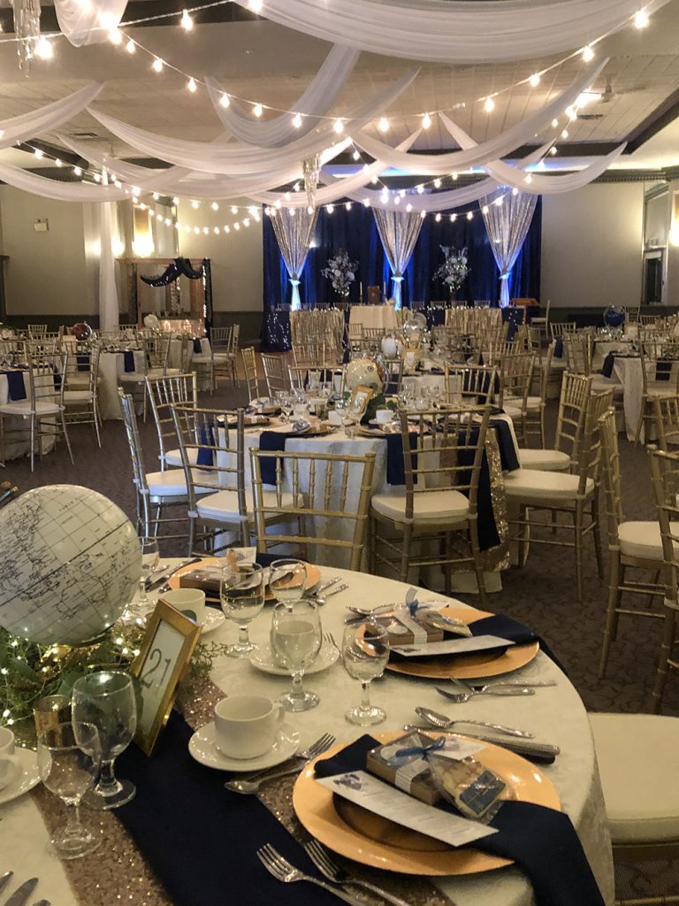 wedding reception ceiling decor with lights and white fabric, neutral wedding palette