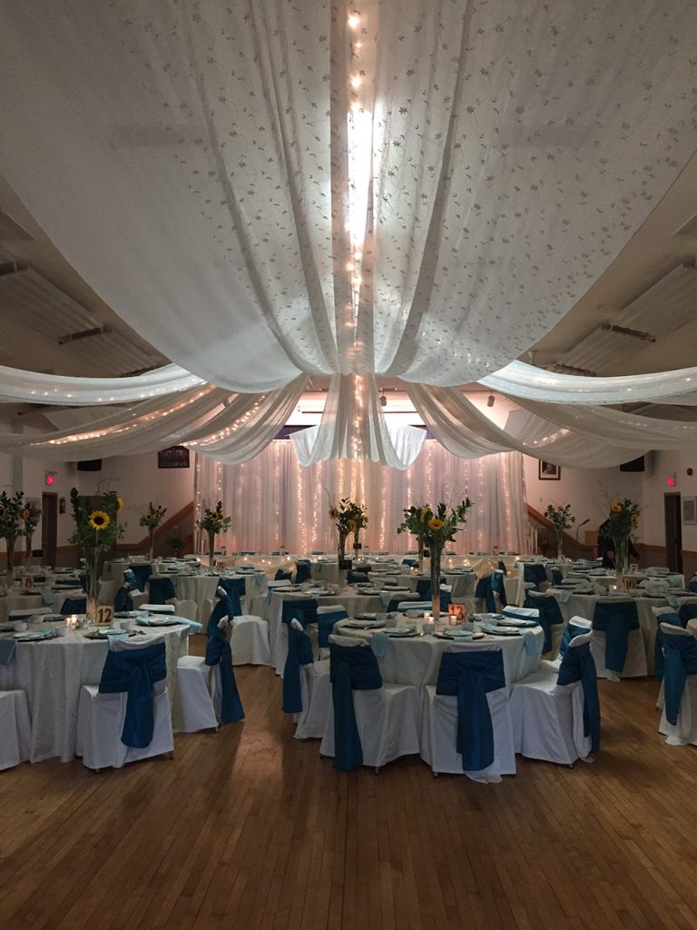 wedding reception decor with ceiling canopy now& always