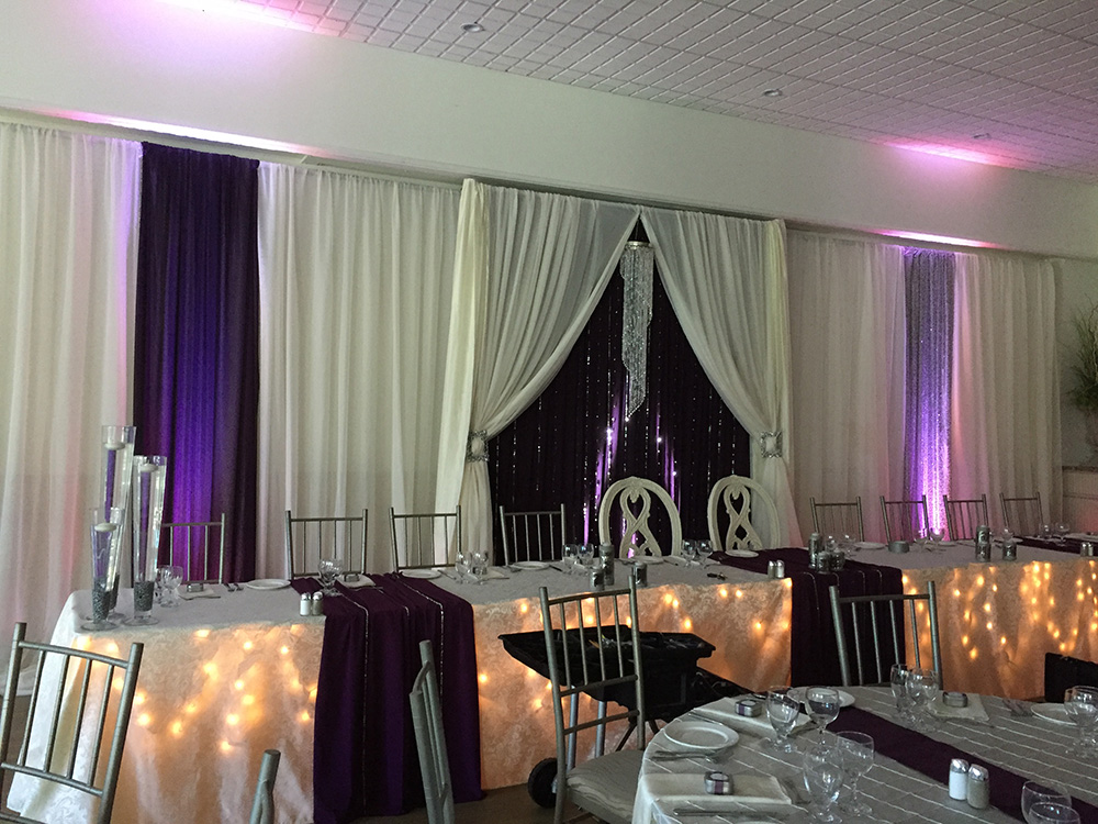 purple, white and lights wedding decor now & always