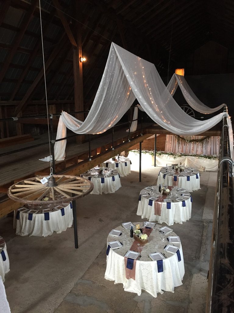 barn wedding decor with ceiling canopy 