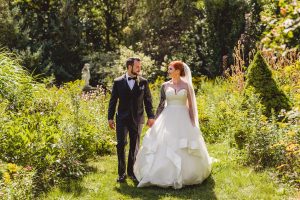 Gary Evans Photography, Marriage Licence, bride and groom holding hands in field