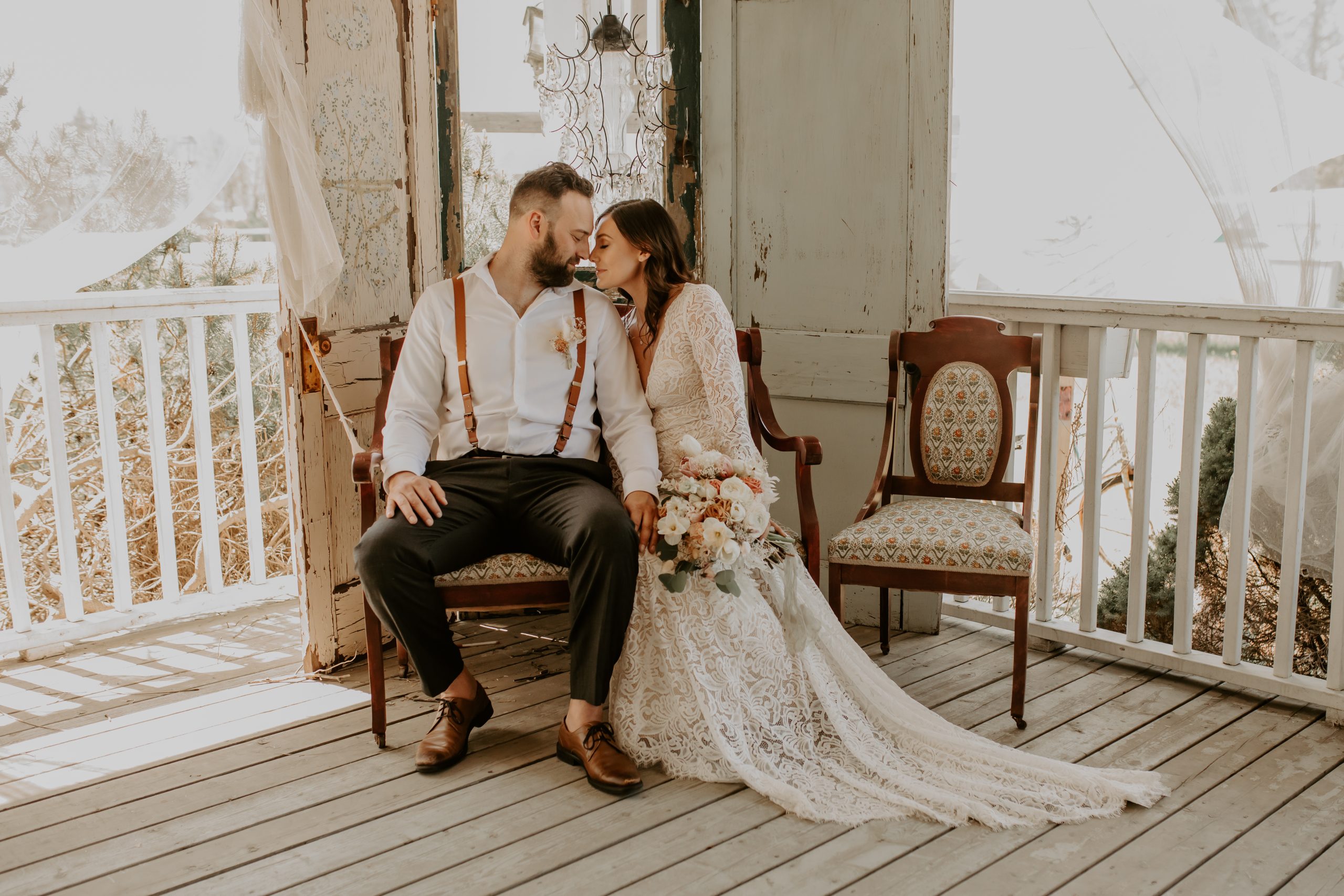 The Wedding Ring, Memories Bridal, Barrie Ontario Gown Shop, Sarah Martin Photoartistry, Barrie Ontario Wedding Photographer, Bride and Groom sitting on white porch looking at each othe
