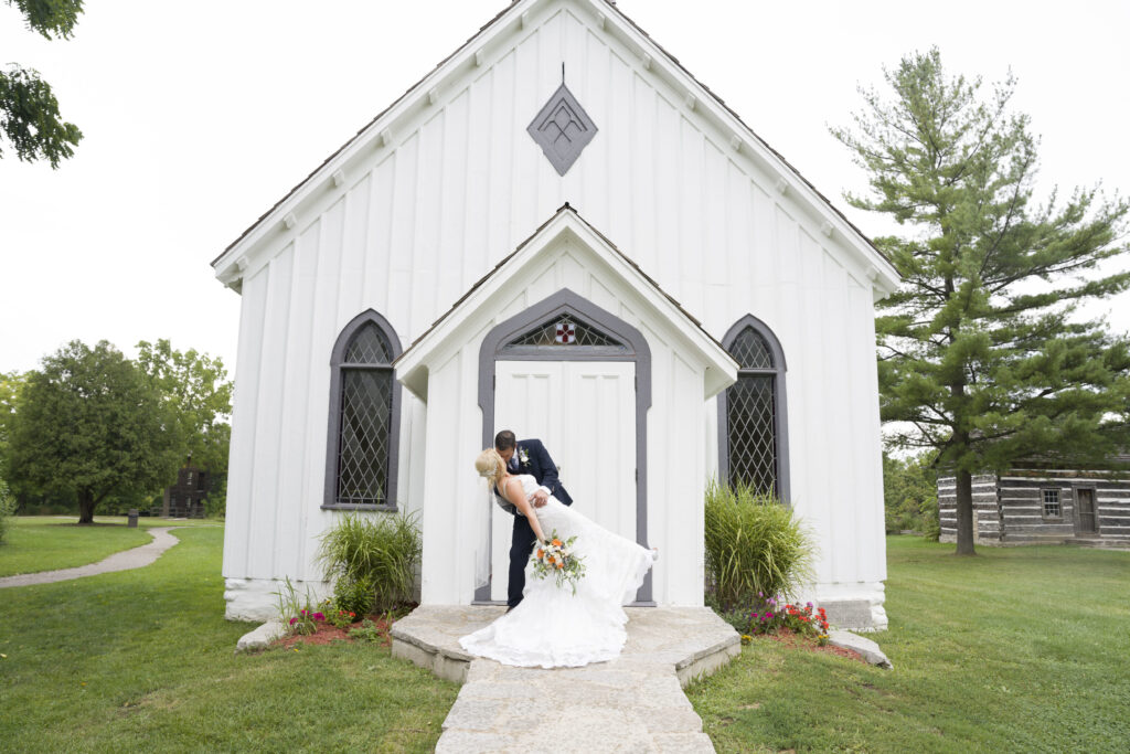 The Wedding Ring, Heart to Heart Photography, Balls falls conservation area, Thorold wedding photographer, Lincoln wedding venue, wedding venue, outdoor wedding venue, bride and groom kissing in front of church