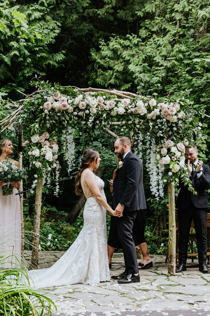 Erin Estates, Wedding Venue, Fedora Media, Cambridge Wedding Photographer, Bride & Groom standing at alter looking at each other getting married