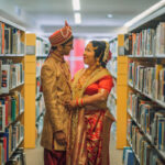 The Wedding Ring, Kitchener Public Library, Peter B Photography, KW wedding photographer, Kitchener wedding venue, Waterloo wedding venue, Cambridge wedding venue, bride and groom in the library aisles surrounded by books