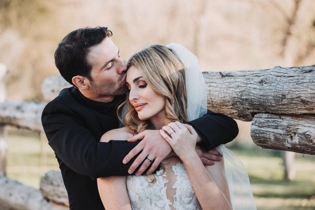 Halloween wedding, Grey silo golf club, Bride & groom hugging